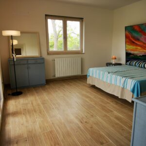 Bedroom, la camera da letto, das Schlafzimmer des Poolhaus.
